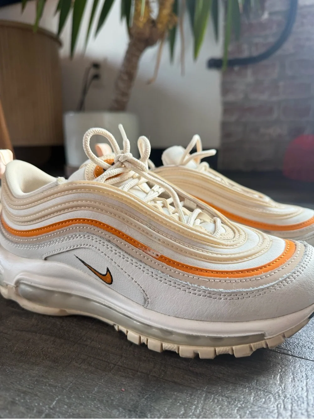 Nike Woman’s White Sneakers with Orange Accents